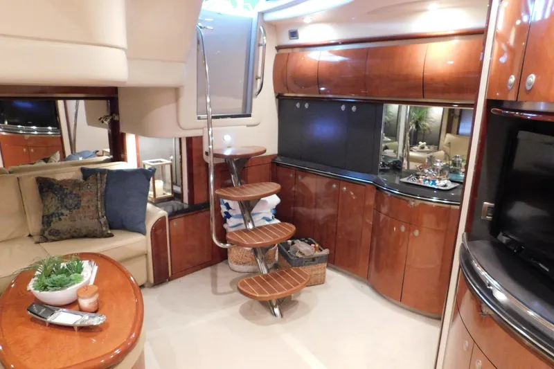 Slide: The Image of Luxurious interior of 2004 Sea Ray 500 Sundancer yacht with elegant wood finishes. - 29