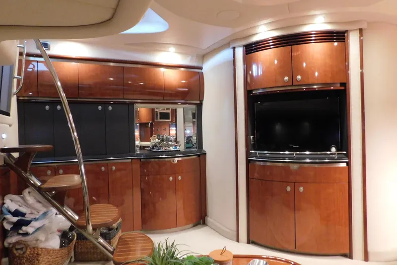Slide: The Image of Luxurious interior of 2004 Sea Ray 500 Sundancer yacht with elegant wood cabinetry. - 31