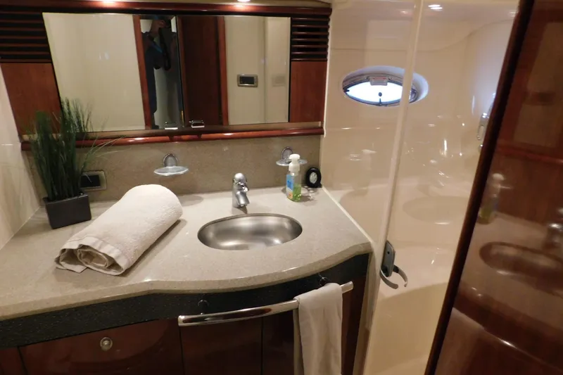 Slide: The Image of Luxurious bathroom in 2004 Sea Ray 500 Sundancer yacht with modern fixtures. - 36