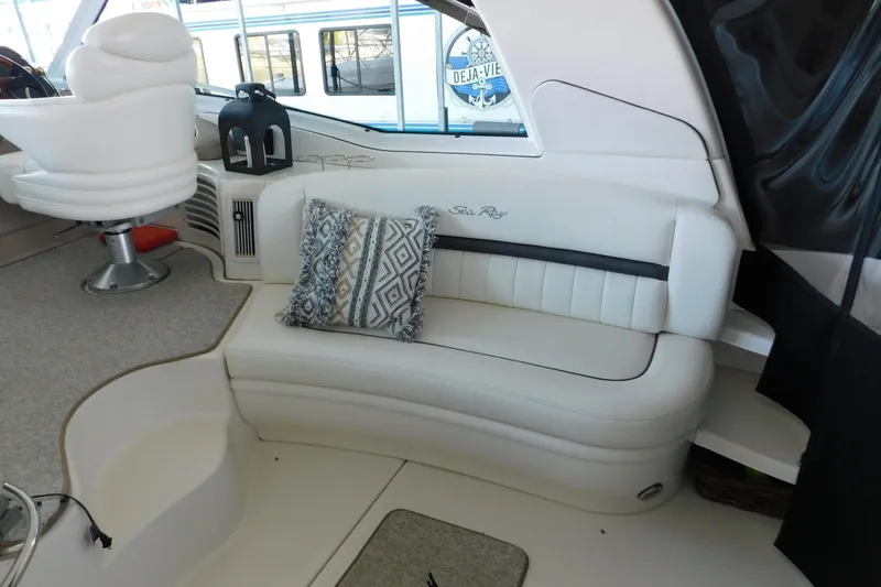 Slide: The Image of Luxurious interior of 2004 Sea Ray 500 Sundancer yacht with plush seating and decor. - 46