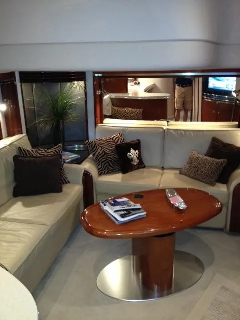 Slide: The Image of Luxurious interior of 2004 Sea Ray 500 Sundancer yacht with plush seating and elegant decor. - 6