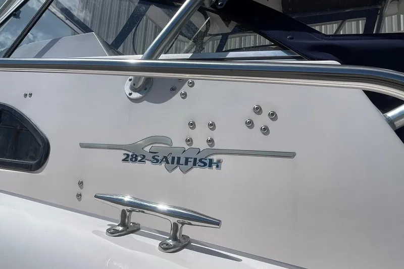 Slide: The Image of 2001 Grady-White Sailfish 255 boat with sleek design and stainless steel fittings. - 12