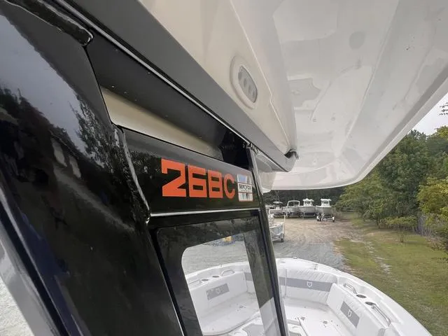 Slide: The Image of 2025 Sea Fox 268 Commander boat, close-up view of the helm area and seating. - 10