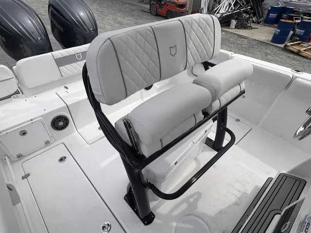 Slide: The Image of 2025 Sea Fox 268 Commander boat with dual seats and sleek design. - 13