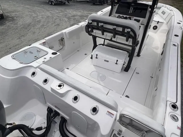 Slide: The Image of 2025 Sea Fox 268 Commander boat interior with seating, console, and storage features. - 8