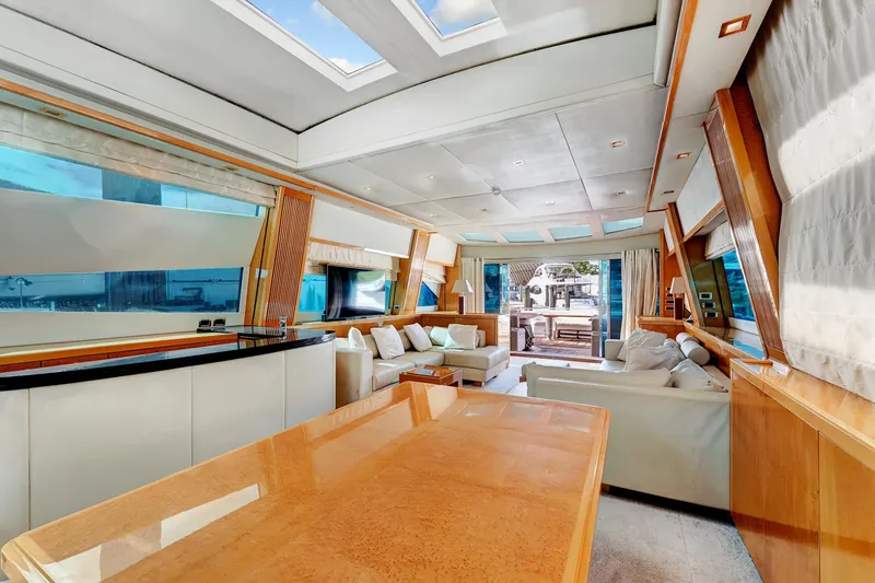 Slide: The Image of Luxurious interior of 2007 Sunseeker Predator 108 yacht with modern furnishings and panoramic windows. - 12
