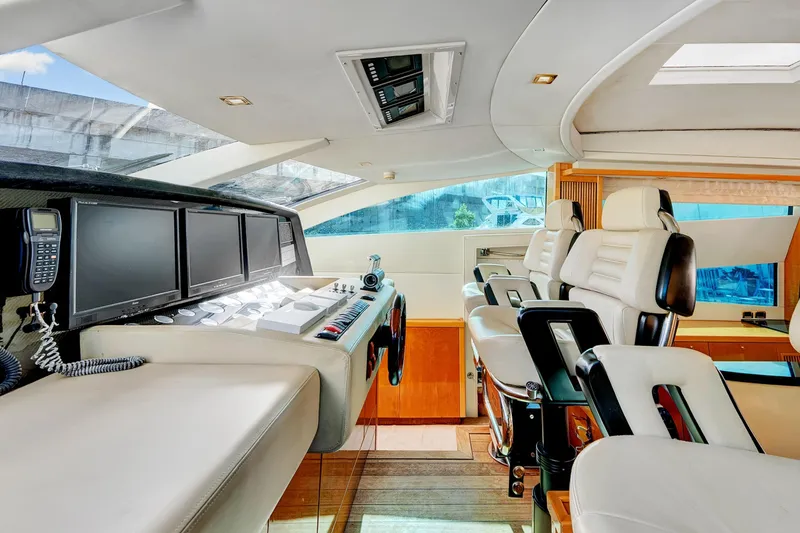 Slide: The Image of Luxurious interior of 2007 Sunseeker Predator 108 yacht with modern cockpit and seating. - 14