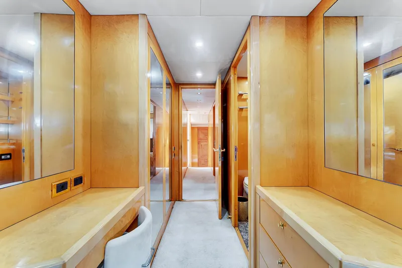 Slide: The Image of Luxurious interior of 2007 Sunseeker Predator 108 yacht with wooden cabinetry and mirrors. - 15
