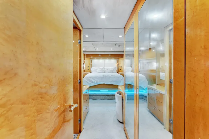 Slide: The Image of Luxurious bedroom interior of 2007 Sunseeker Predator 108 yacht with elegant wood finishes. - 18