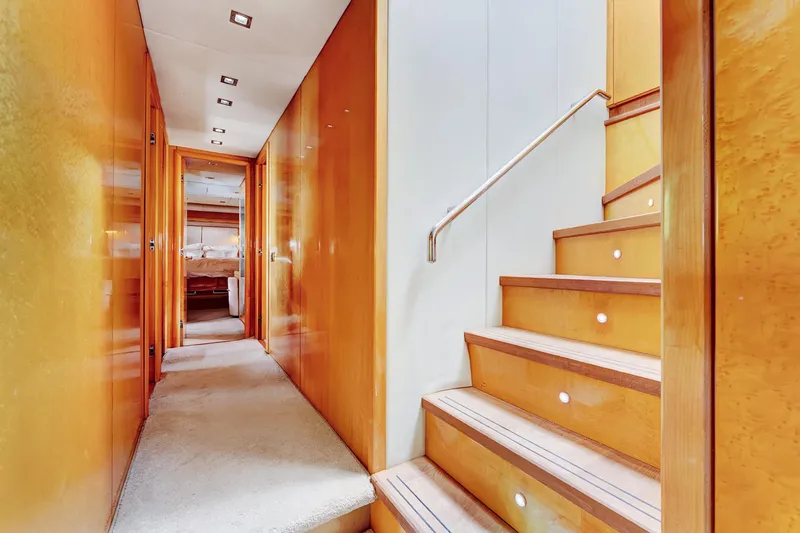 Slide: The Image of Luxurious interior of 2007 Sunseeker Predator 108 yacht with wooden stairs and hallway. - 19