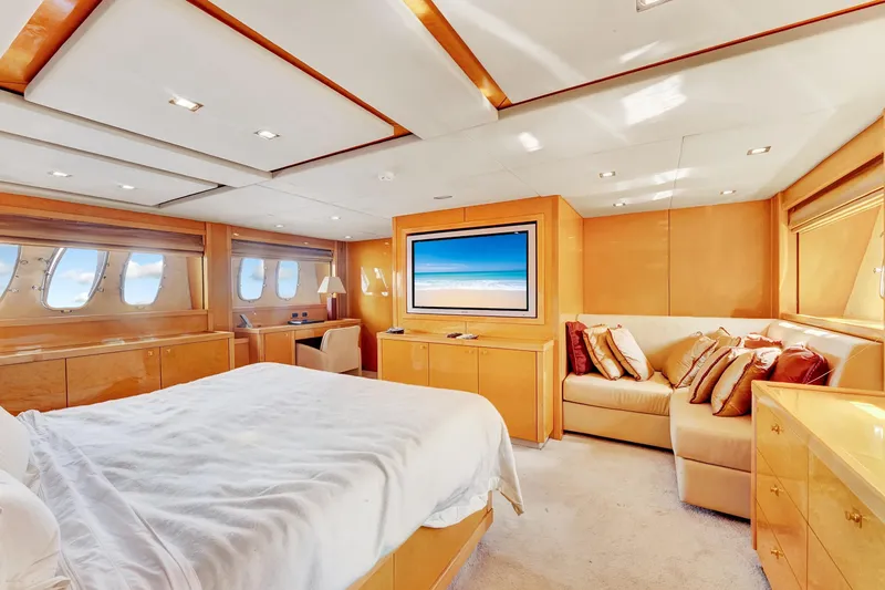 Slide: The Image of Luxurious bedroom interior of 2007 Sunseeker Predator 108 yacht with elegant furnishings and large windows. - 23