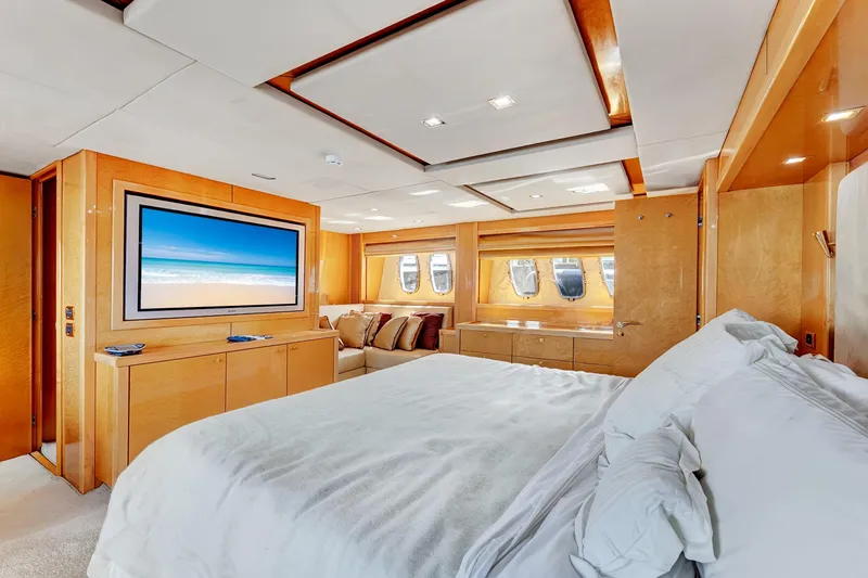 Slide: The Image of Luxurious bedroom interior of 2007 Sunseeker Predator 108 yacht with modern decor and large TV. - 25