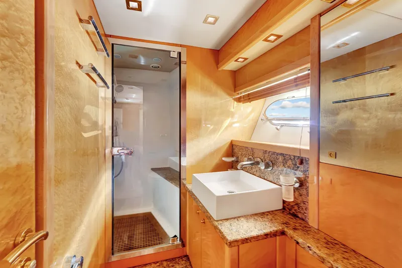 Slide: The Image of Luxurious bathroom on 2007 Sunseeker Predator 108 yacht with modern fixtures and elegant design. - 29