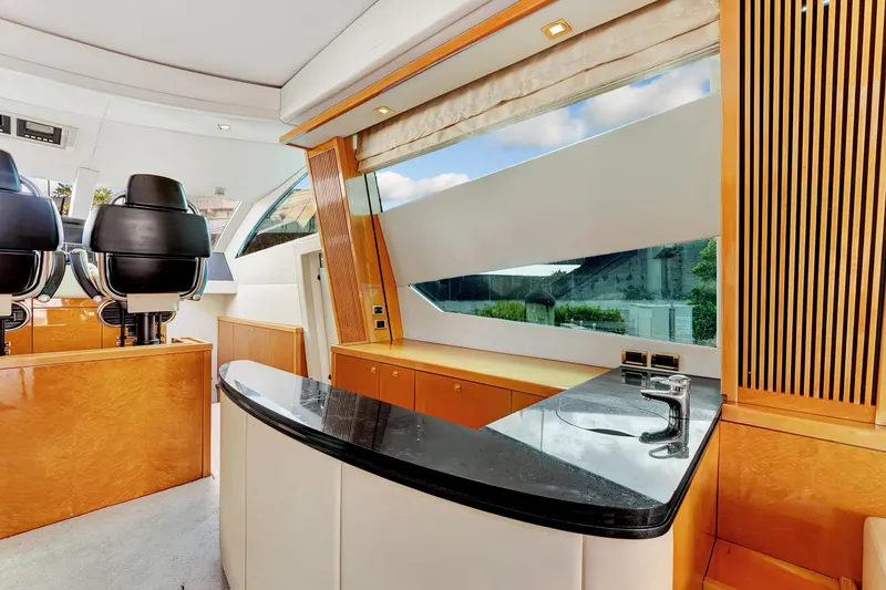 Slide: The Image of Luxurious interior of 2007 Sunseeker Predator 108 yacht with sleek design and modern amenities. - 34