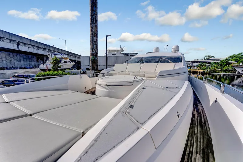 Slide: The Image of 2007 Sunseeker Predator 108 yacht with sleek design and spacious deck, docked near marina. - 39