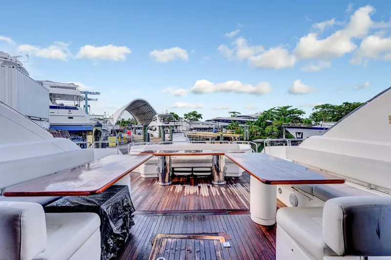 Slide: The Image of Luxurious 2007 Sunseeker Predator 108 yacht deck with elegant seating and wooden flooring. - 43