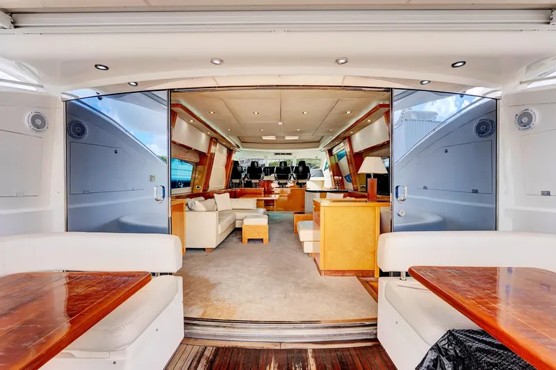 Slide: The Image of Luxurious interior of 2007 Sunseeker Predator 108 yacht with elegant seating and wooden accents. - 6