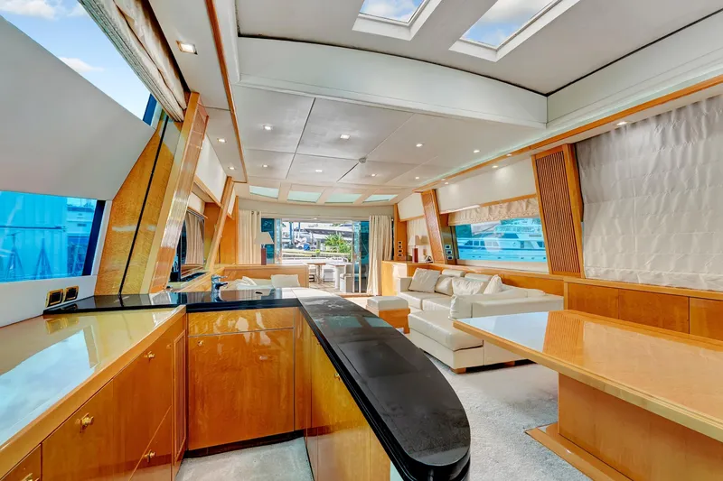 Slide: The Image of Luxurious interior of 2007 Sunseeker Predator 108 yacht with modern furnishings and ample natural light. - 9