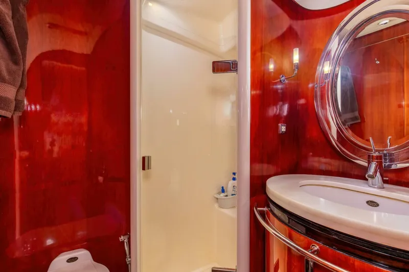 Slide: The Image of Luxurious bathroom interior on 2004 Custom Ebony Sportfish 65' CNV yacht. - 23