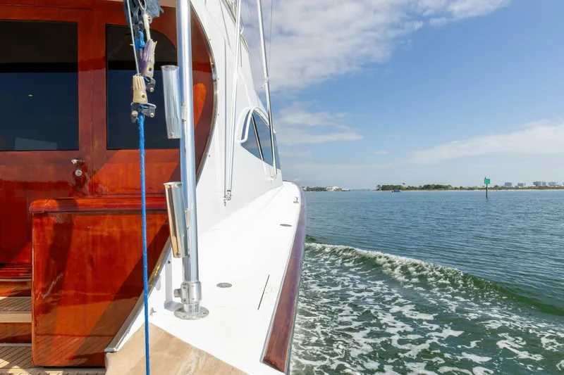 Slide: The Image of Custom Ebony Sportfish 65' CNV yacht cruising on open water, 2004 model. - 41