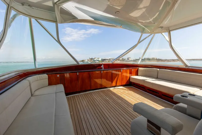 Slide: The Image of Luxurious interior of 2004 Custom Ebony Sportfish 65' CNV yacht with panoramic views. - 7
