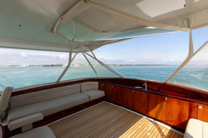 Slide: The Image of Luxurious interior of 2004 Custom Ebony Sportfish 65' CNV yacht with ocean view. - 8