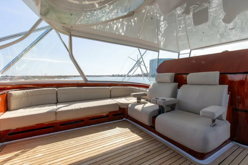 Slide: The Image of Luxurious seating area on 2004 Custom Ebony Sportfish 65' CNV yacht. - 9