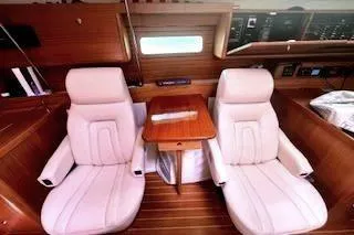 Slide: The Image of Swiveling Reclining Chairs with "Champagne" Color Ultraleather upholstery. - 16