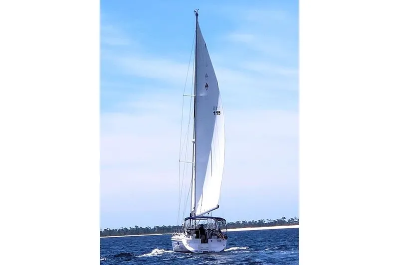 Slide: The Image of Sailing yacht Catalina 445, 2016 model, cruising on open water under clear skies. - 2