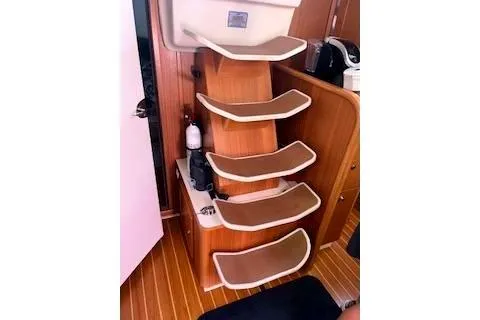 Slide: The Image of Interior stairs of a 2016 Catalina 445 yacht with wooden finish. - 20