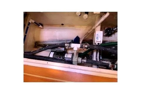 Slide: The Image of 2016 Catalina 445 yacht plumbing system with hoses and fittings. - 21