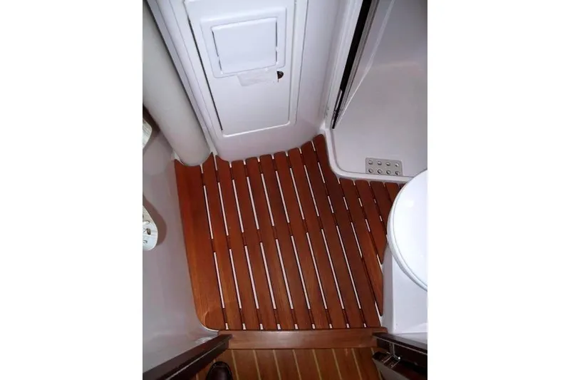 Slide: The Image of 2016 Catalina 445 yacht interior with wooden slatted flooring in the bathroom area. - 35