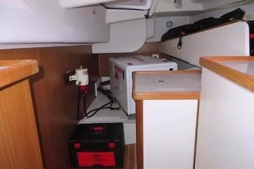 Slide: The Image of Port side flex cabin with Westerbeke generator, storage and berth. - 44