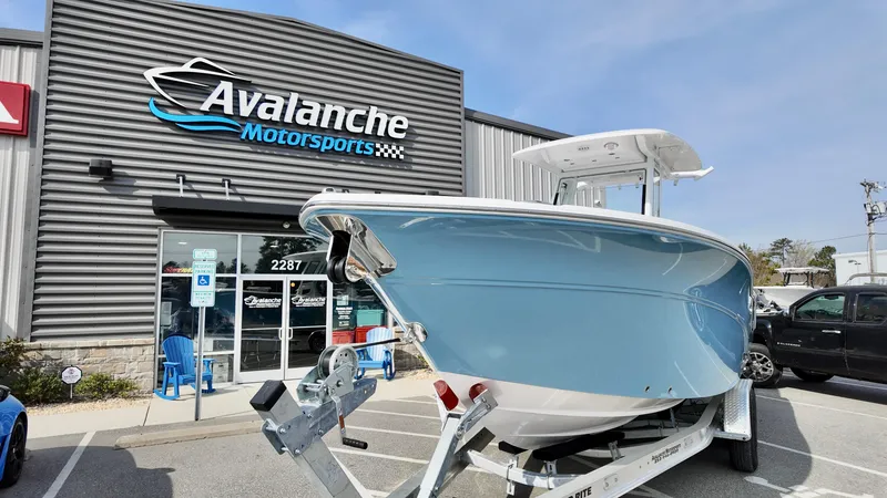 Slide: The Image of 2025 Sea Fox 268 Commander boat displayed at Avalanche Motorsports dealership. - 2