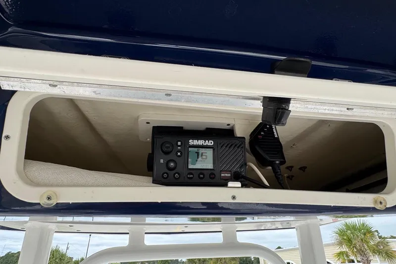 Slide: The Image of Simrad radio installed in 2021 Robalo R242 Explorer boat compartment. - 16