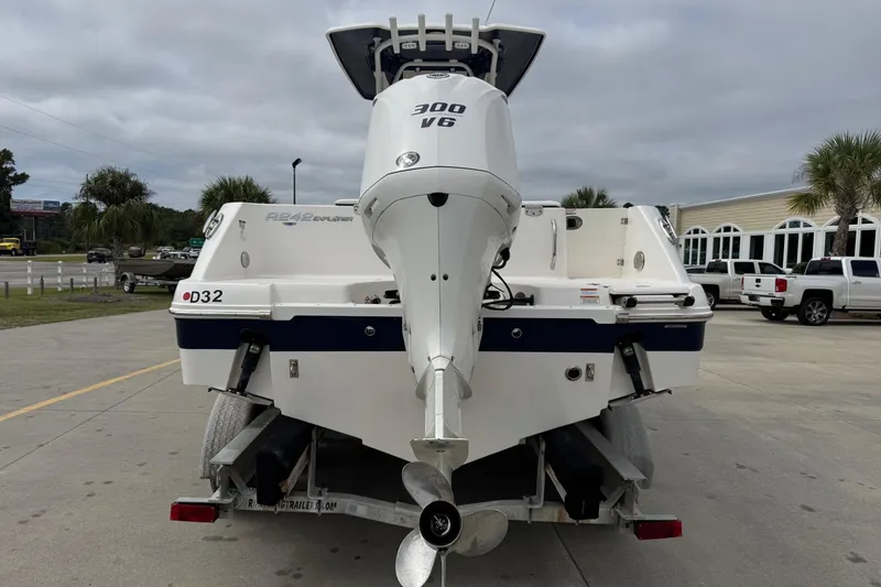 Slide: The Image of 2021 Robalo R242 Explorer boat with 300 V6 engine on trailer. - 4