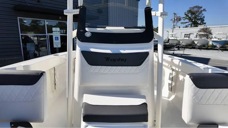 Slide: The Image of 2025 Bayliner Trophy 20 boat interior with seating and console. - 6