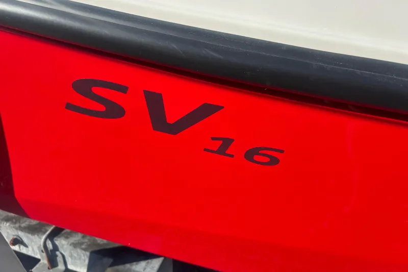 Slide: The Image of Red Starcraft SV 16 OB boat, model year 2026, close-up view. - 8