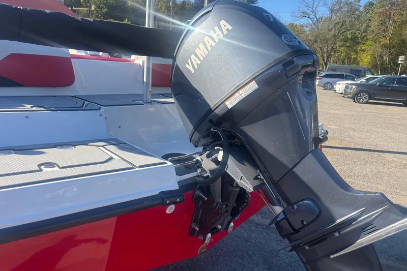 Slide: The Image of 2026 Starcraft SV 16 OB boat with Yamaha outboard motor in a parking lot. - 9