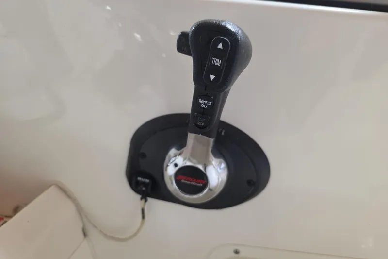 Slide: The Image of Throttle control lever on a 2006 Boston Whaler 205 Conquest boat. - 6