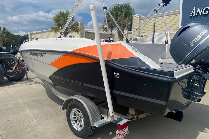 Slide: The Image of 2021 Starcraft SVX 171 OB boat with Yamaha outboard motor on trailer. - 2