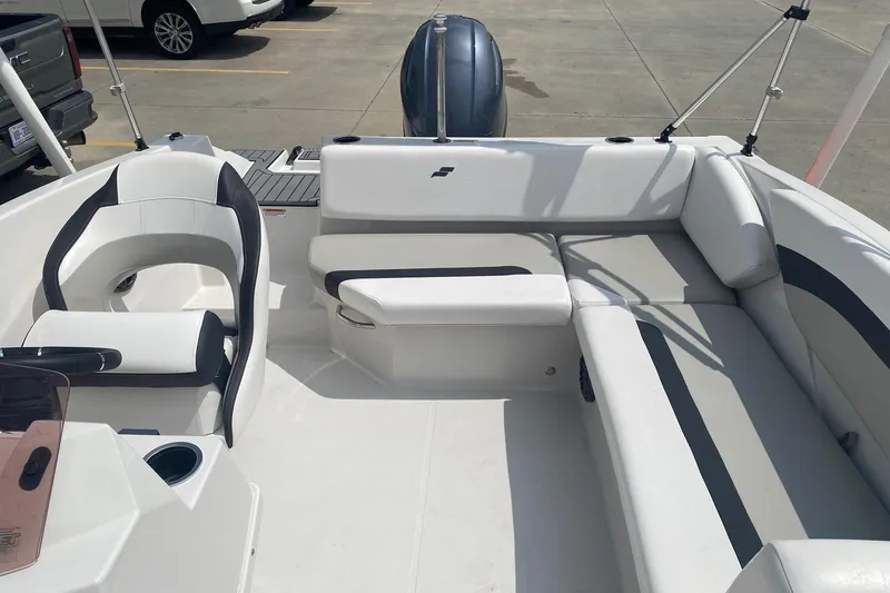 Slide: The Image of 2021 Starcraft SVX 171 OB boat interior with white and black seating. - 5