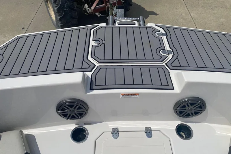 Slide: The Image of 2021 Starcraft SVX 171 OB boat deck with speakers and non-slip surface. - 9