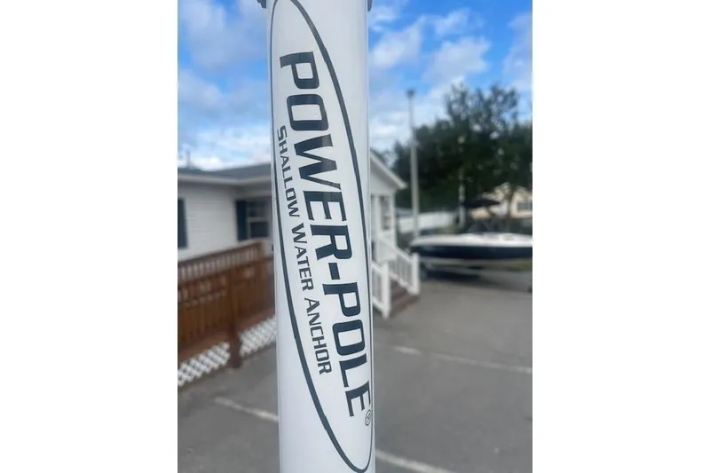 Slide: The Image of Power-Pole shallow water anchor on 2022 Pioneer 202 Islander boat. - 13