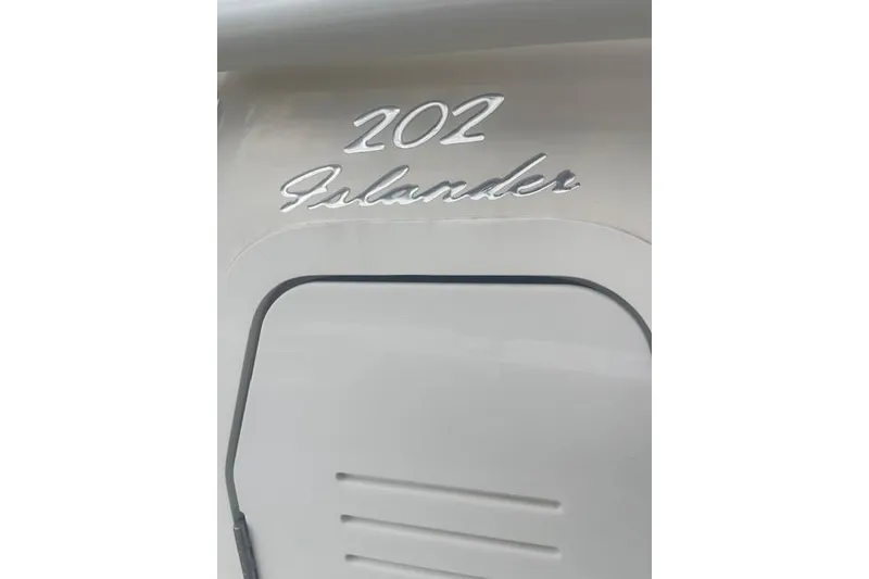 Slide: The Image of Close-up of 2022 Pioneer 202 Islander boat model nameplate. - 17