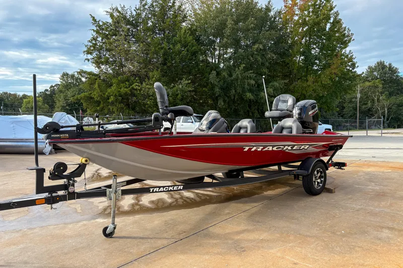 Slide: The Image of 2020 Tracker Pro Team 175 TXW boat on trailer, parked outdoors. - 11