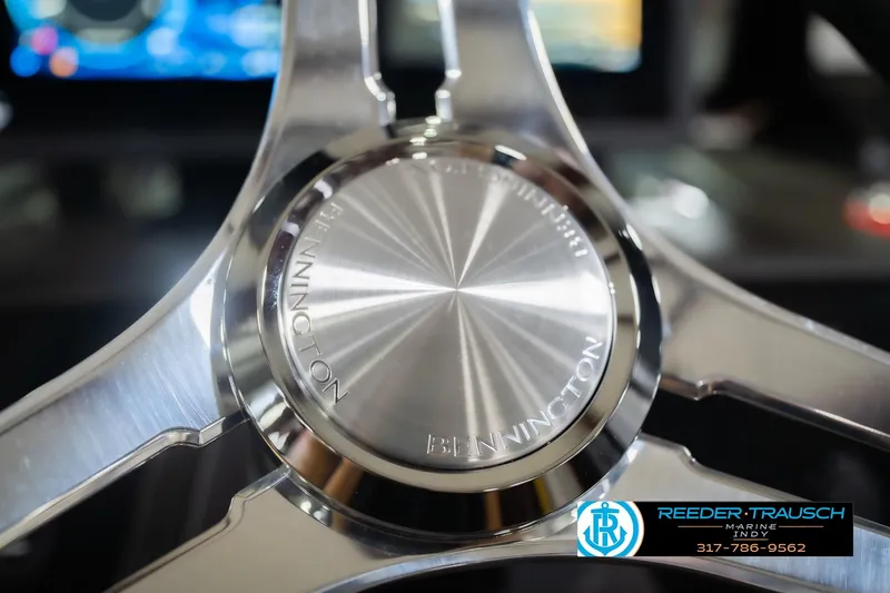 Slide: The Image of Close-up of 2026 Bennington 22 ML steering wheel with Reeder-Trausch Marine logo. - 37