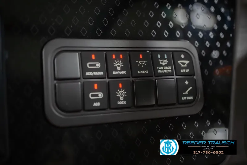 Slide: The Image of Control panel of 2026 Bennington 22 ML boat with various function buttons. - 39