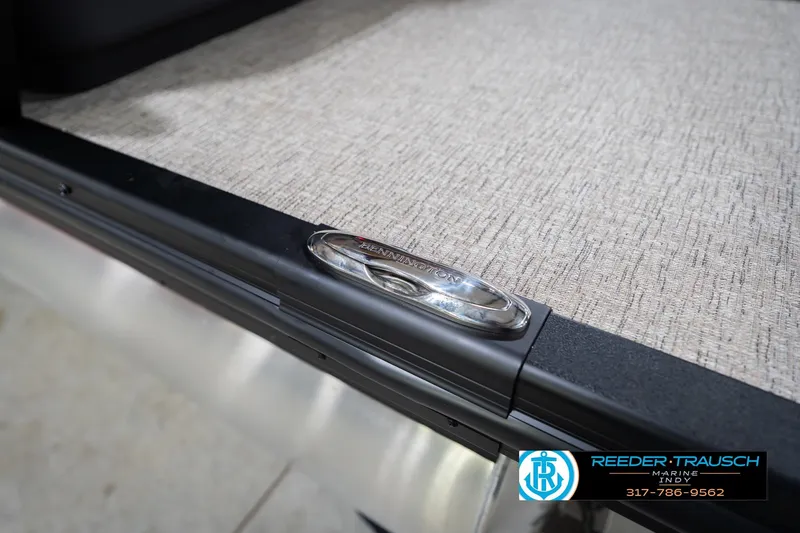 Slide: The Image of 2026 Bennington 22 ML boat detail with logo and textured flooring. - 64