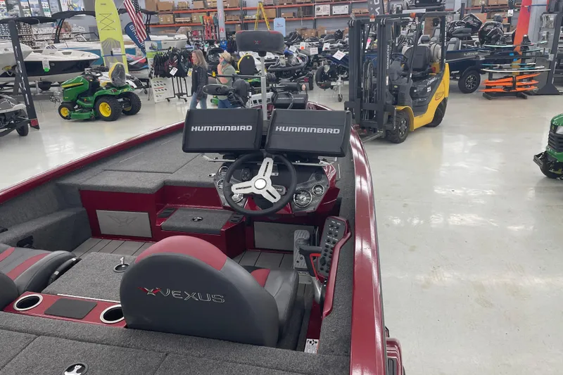 Slide: The Image of 2023 Vexus AVX1980 boat interior with Humminbird electronics in showroom. - 8